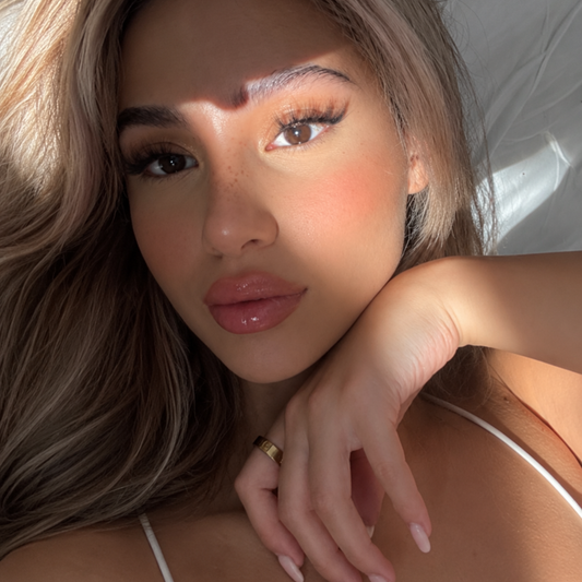 Woman with softly enhanced lips after Paradise Lip™ half syringe lip injections at Paradise Laser in Delray Beach