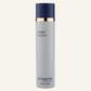 Skin Better Science AlphaRet Cleansing Serum in a tall 1.7oz cylindrical bottle with a light gray body, dark navy blue cap, and a metallic gold collar, shown on a light off-white background.